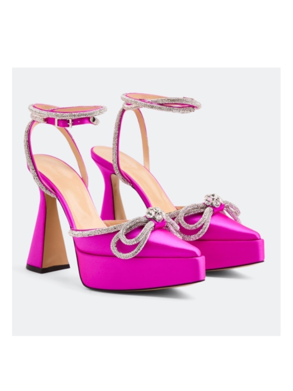 MACH & MACH
Double bow platform pumps
$1,294 size 40 US 10
